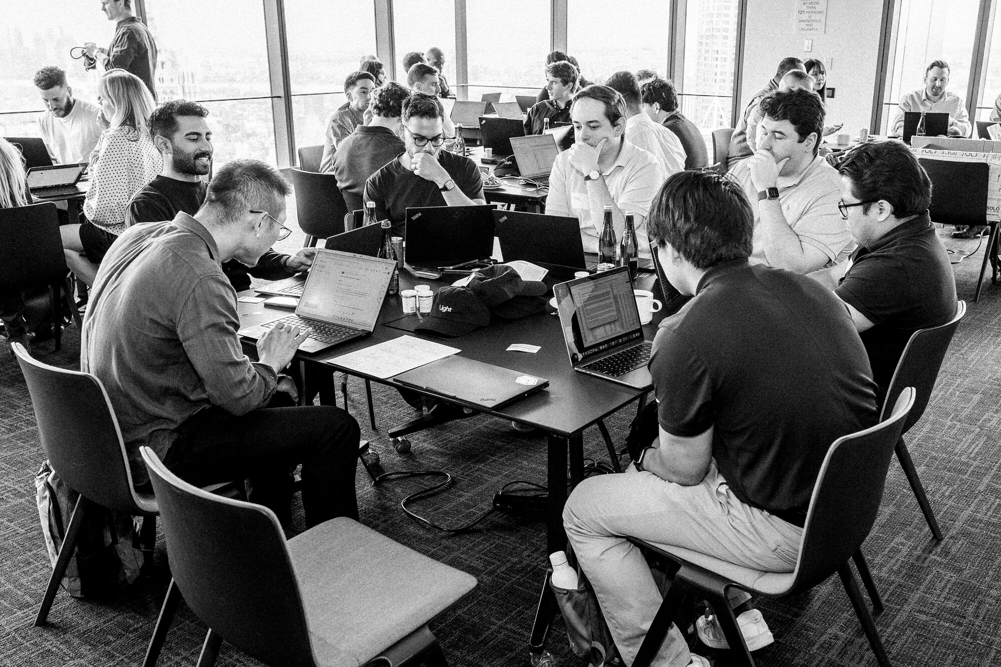 Teams deep in the build on the hackathon floor at McKinsey Global HQ